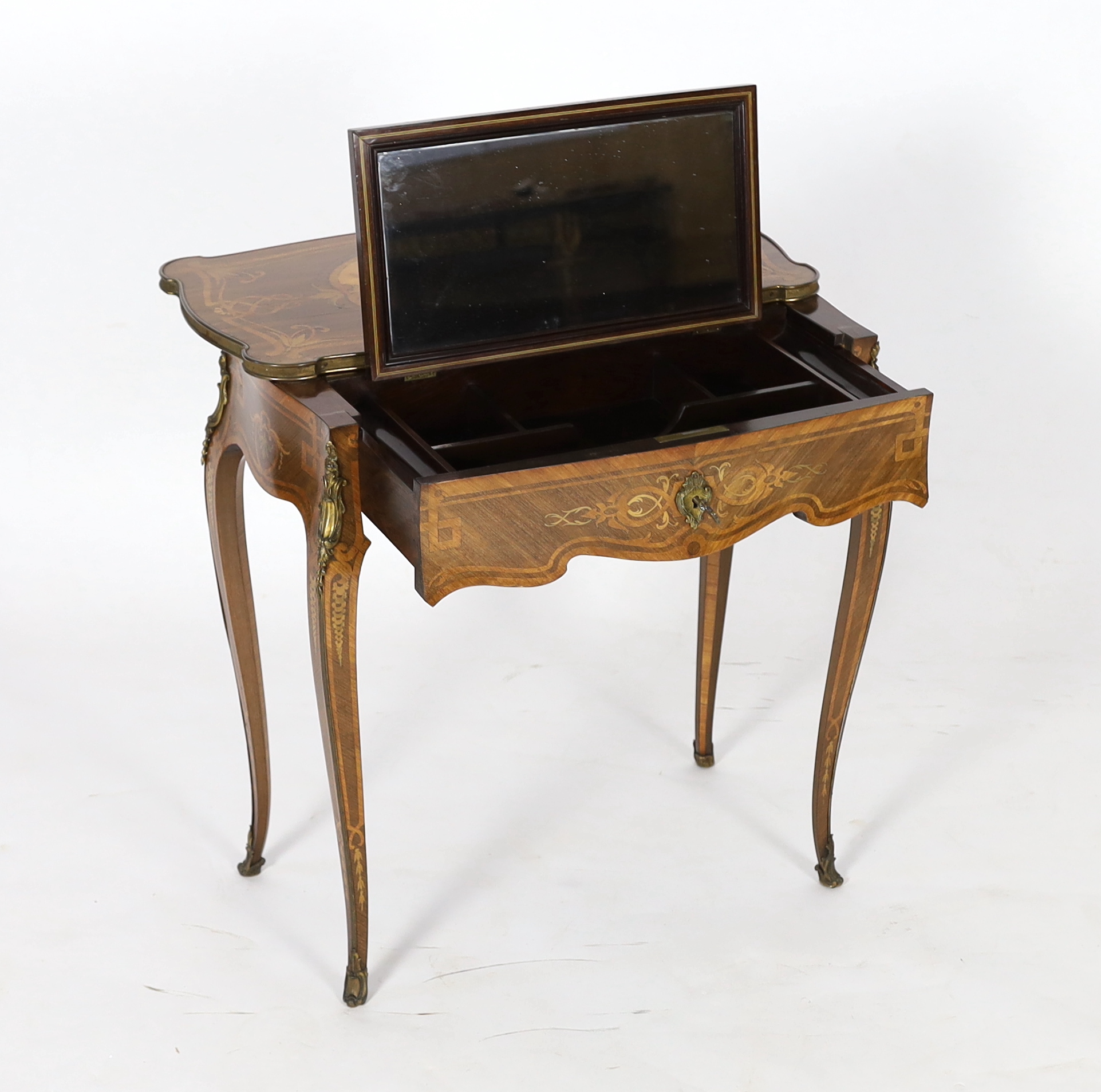 A Louis XV style marquetry side table, 66cm wide, 37cm deep, 68cm high, Please note this lot attracts an additional import tax of 5% on the hammer price